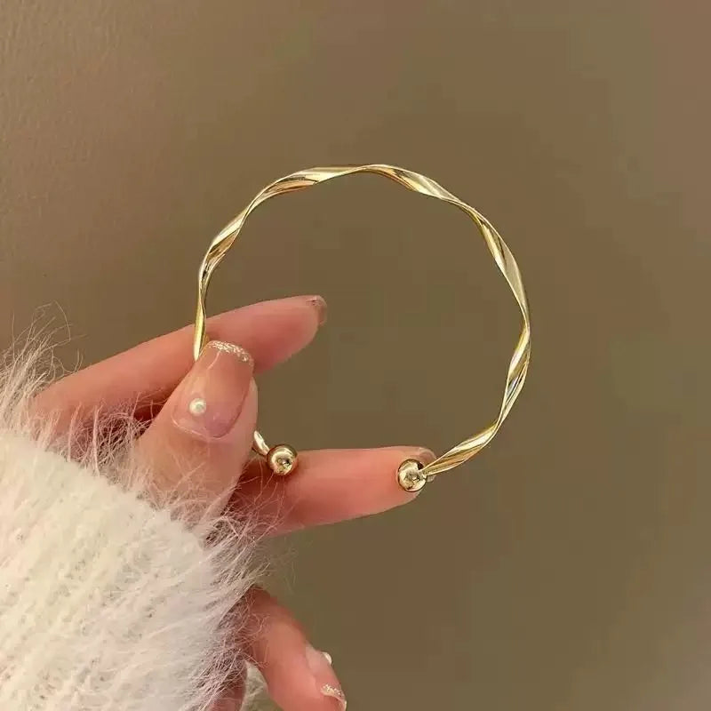 Twist Elegance Adjustable Bangle Bracelet